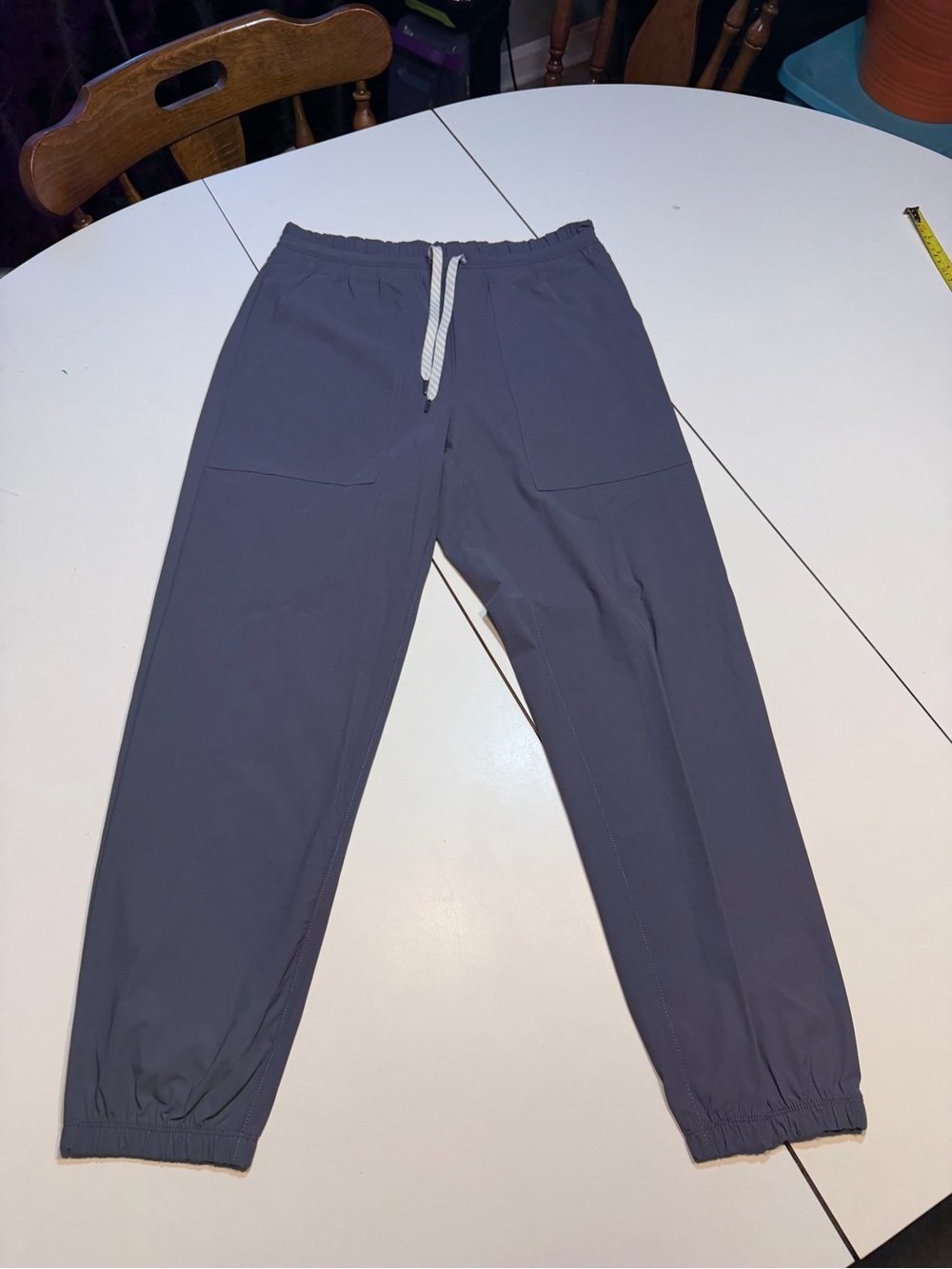 Vuori Women's Miles Joggers small grey drawstring waist and ribbed ankle cuffs.